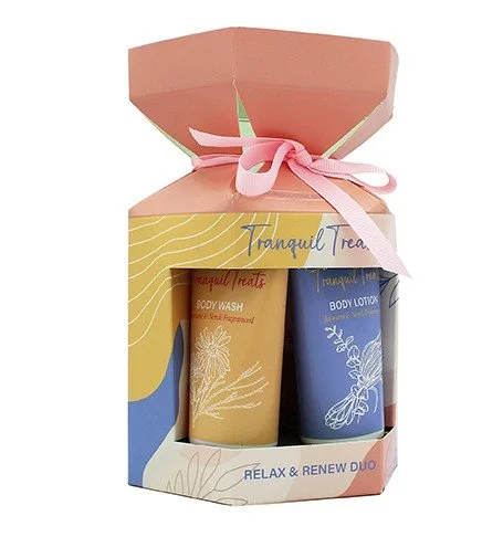 Tranquil Treats darčeková sada sprchový gél + telové mlieko 50 ml + umývacia špongia